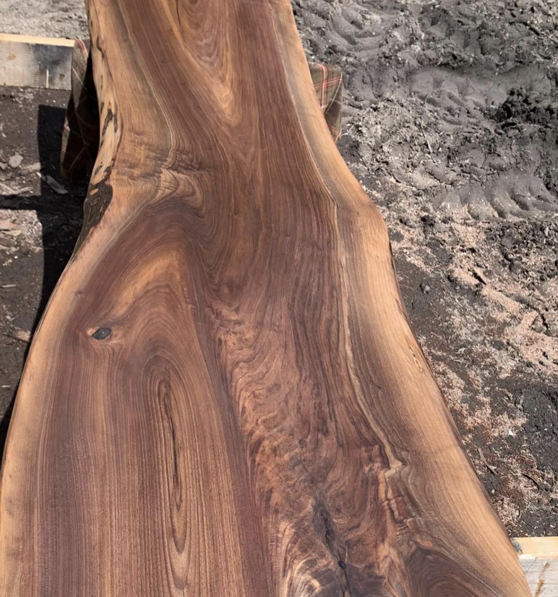 Close-up of a dark slab with flowing grain